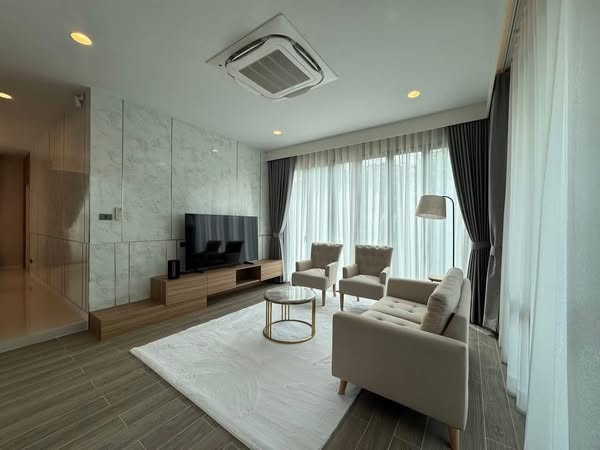 bedroom and living room of Burasiri Krungthep Kreetha