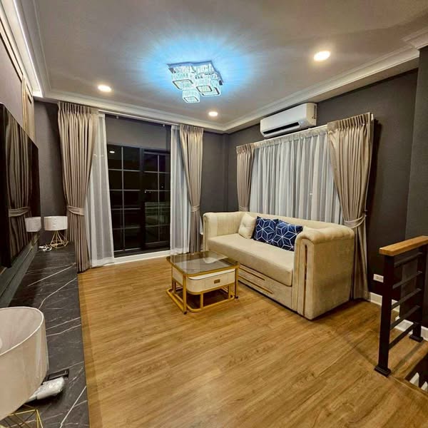 bedroom and living room of Centro Bangna