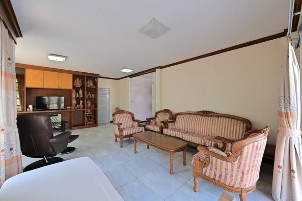 bedroom and living room of Home Place Village