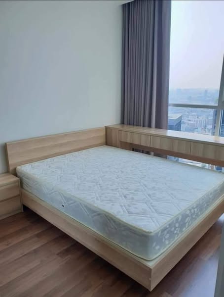 bedroom of Noble Revolve Ratchada 2