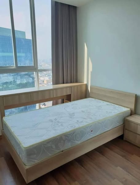 bedroom of Noble Revolve Ratchada 2