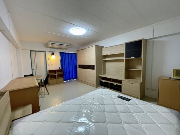 bedroom of Studio One Condo