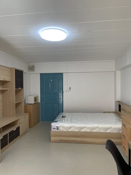 bedroom of Studio One Condo