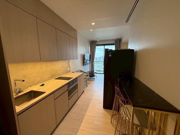 bathroom and kitchen of The Lofts Silom by Raimon Land