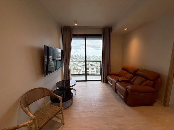 bedroom and living room of The Lofts Silom by Raimon Land