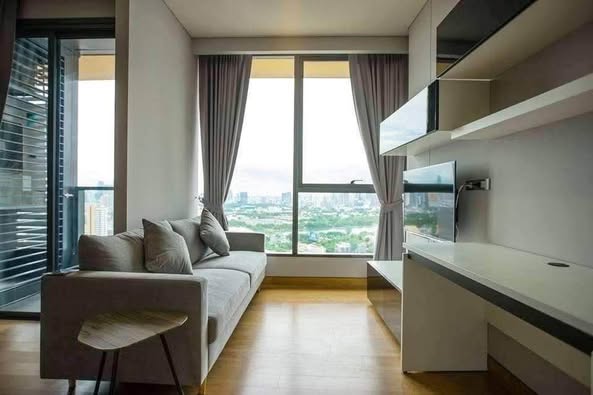 living room and bedroom of The Lumpini 24