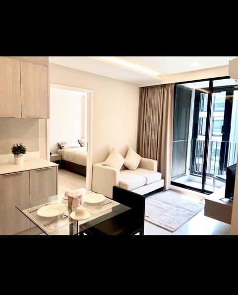 bedroom and living room of VTARA36 Condominium