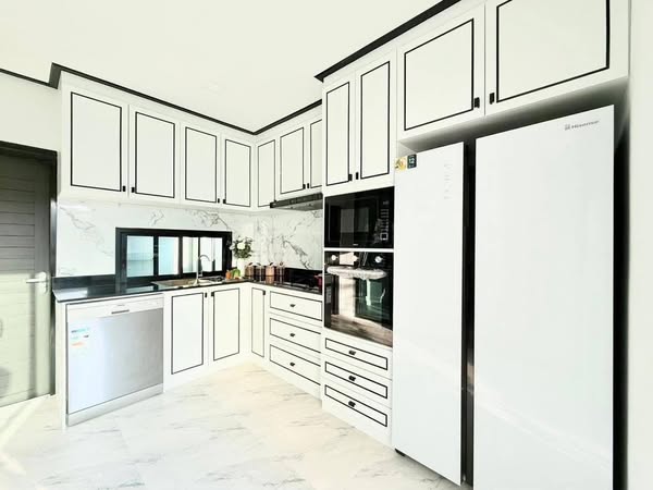 kitchen of บ้านพักพลูวิลล่า 965 poolvilla ติดทะเล