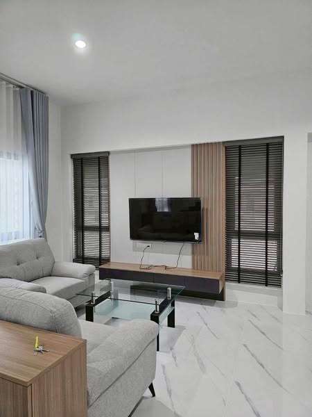 living room and bedroom of Graceland Family Residences