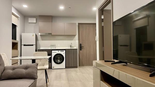 living room and kitchen of Life พหลฯ-ลาดพร้าว | Life Phahon-Ladprao | First Class Living in The Heart of Ladprao