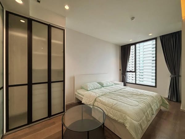 bedroom and room interior of MUNIQ Sukhumvit 23