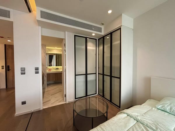 bedroom and room interior of MUNIQ Sukhumvit 23