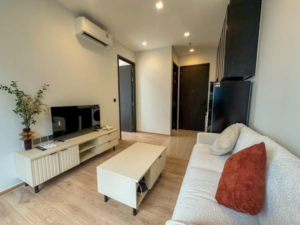 living room and bedroom of Noble Around Ari