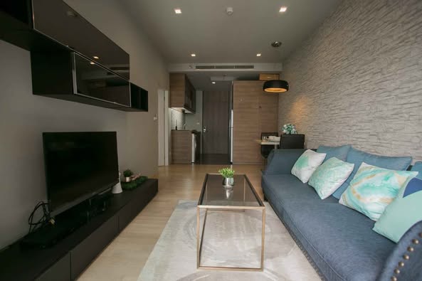 bedroom and living room of Noble Refine