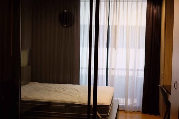 bedroom of Noble Revo Silom