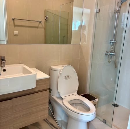 room interior and bathroom of Noble Revolve Ratchada 2
