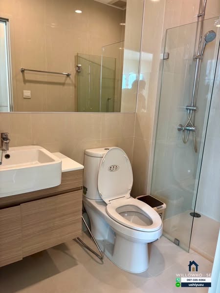 room interior and bathroom of Noble Revolve Ratchada 2
