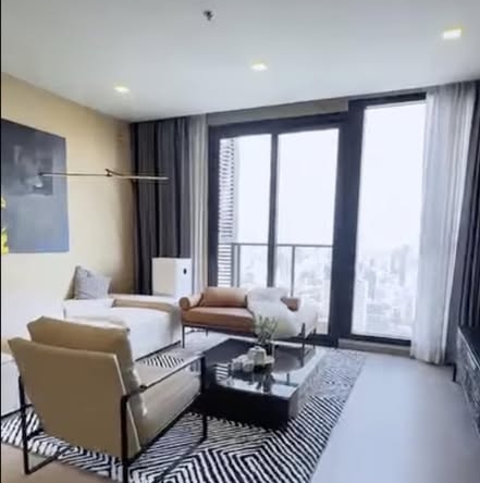 bedroom and living room of One9Five Asoke – Rama 9