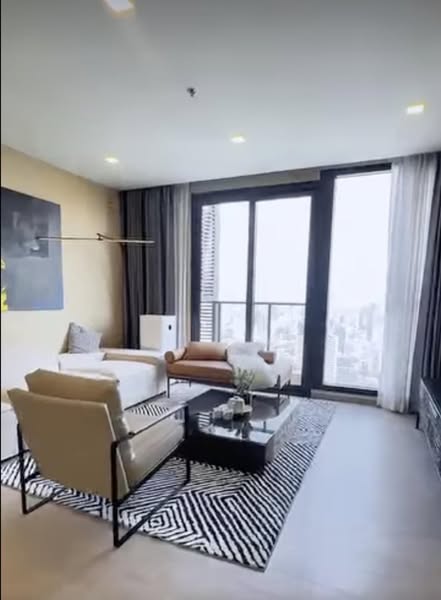 bedroom and living room of One9Five Asoke – Rama 9