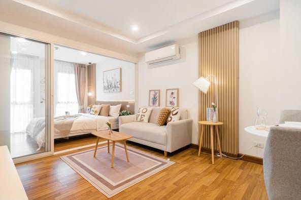 bedroom and living room of Parc Exo Condominium |