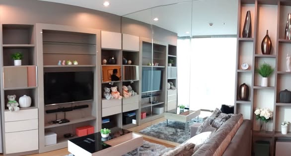 bedroom and living room of The Breeze Naradhiwas