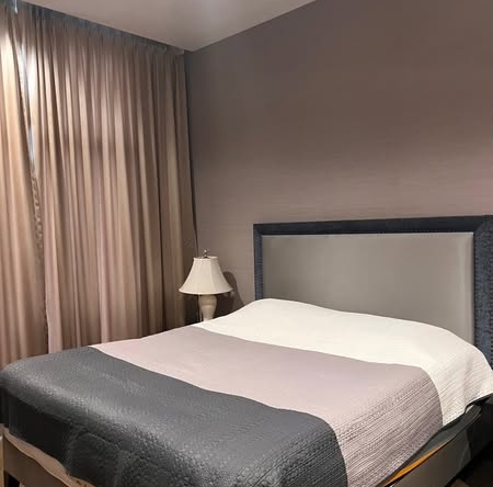 bedroom of The Diplomat Sathorn