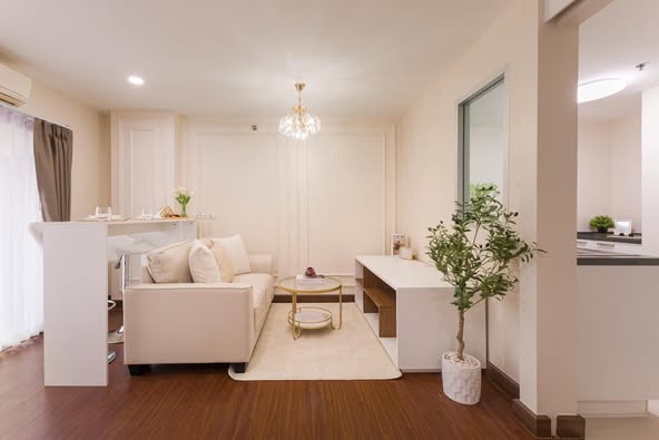 living room and bedroom of The Escape Condominium – ดิ เอสเคป คอนโดมิเนียม