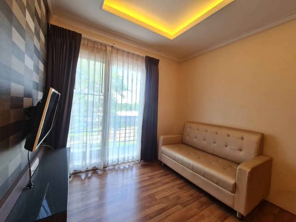 bedroom and living room of The Grand Benefits Condo 2