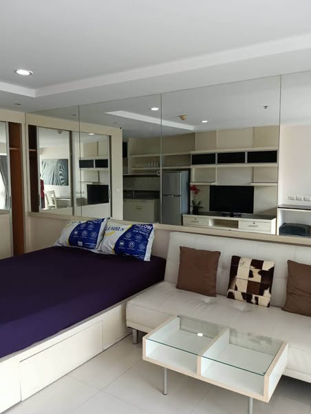 bedroom of The Trendy Condominium