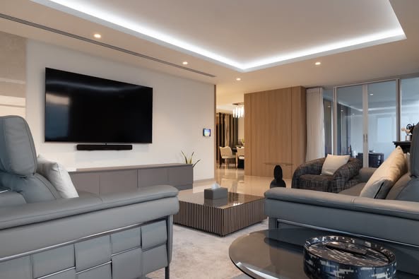 bedroom and living room of THEA Private Suites by TH District