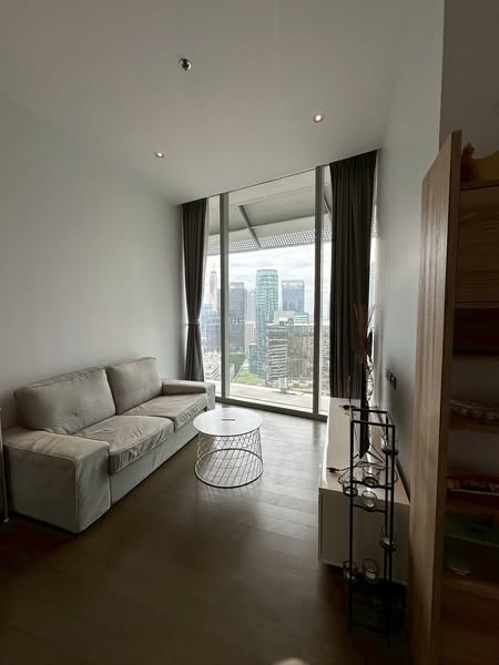 living room and bedroom of Magnolias Ratchadamri Boulevard