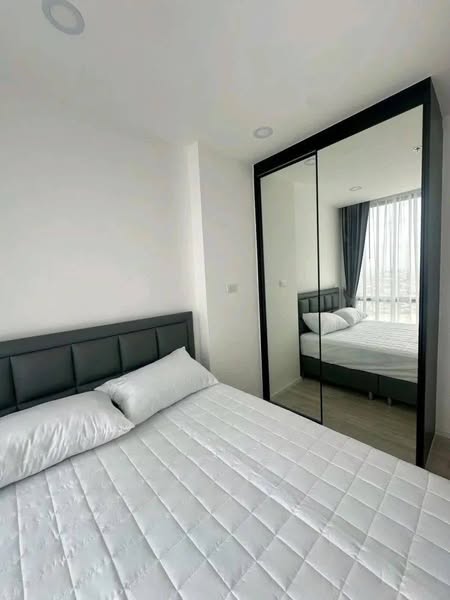bedroom and room interior of The Clev Riverline Chaophraya – Wong Sawang