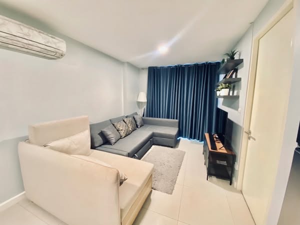 living room and bedroom of The Clover