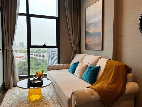 bedroom and living room of The Diplomat Sathorn