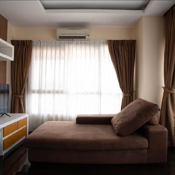 bedroom and living room of 42 Grand Residence