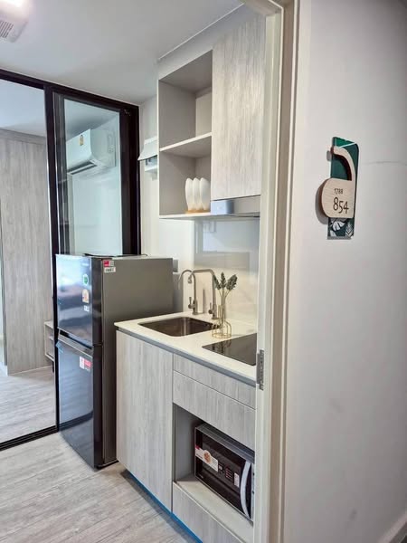 room interior and bathroom and kitchen of Atmoz Tropicana Bangna