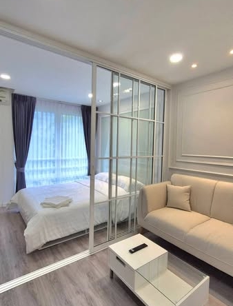 bedroom and room interior of i-House Laguna Garden RCA – Building A (Blue)