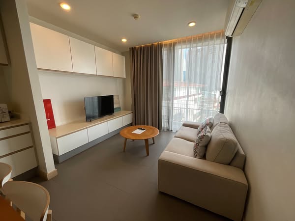 living room and bedroom of Mattani Suites