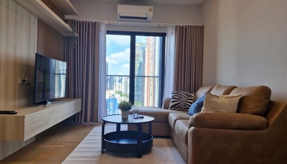 bedroom and living room of Noble Reveal