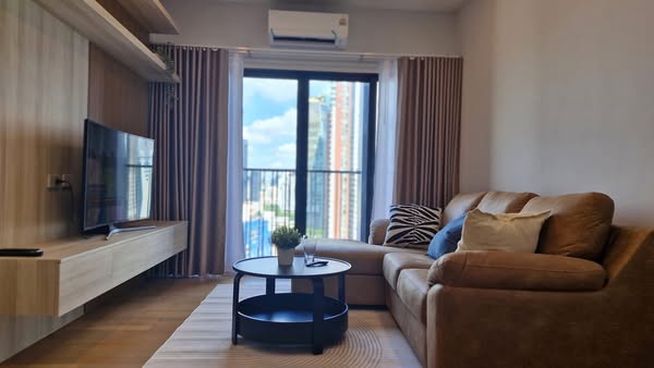 bedroom and living room of Noble Reveal