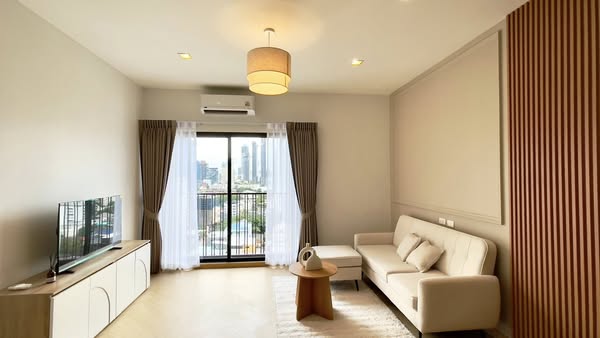 bedroom and living room of Noble Reveal