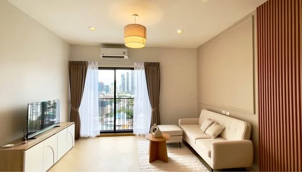bedroom and living room of Noble Reveal