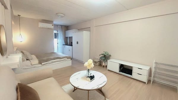 bedroom and living room of Ratchada Resort Condo