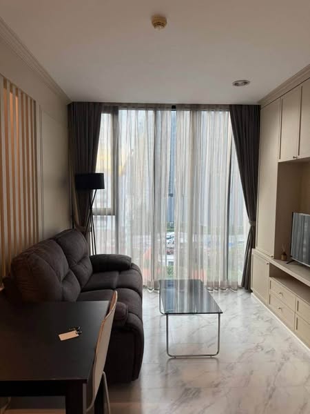 bedroom and living room of The Alcove Thonglor 10