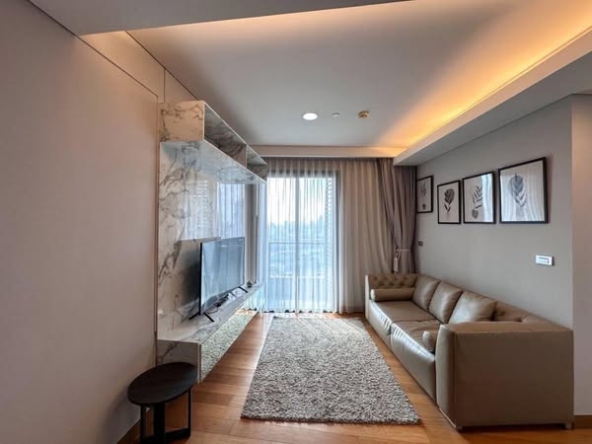 bedroom and living room of The Lumpini 24