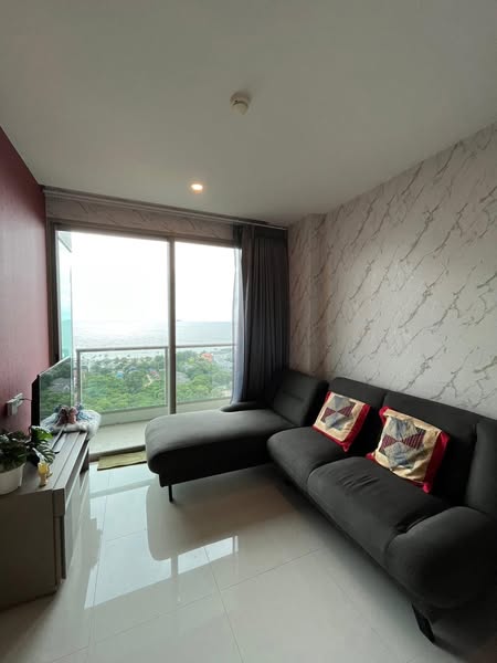bedroom and living room of The Riviera Jomtien