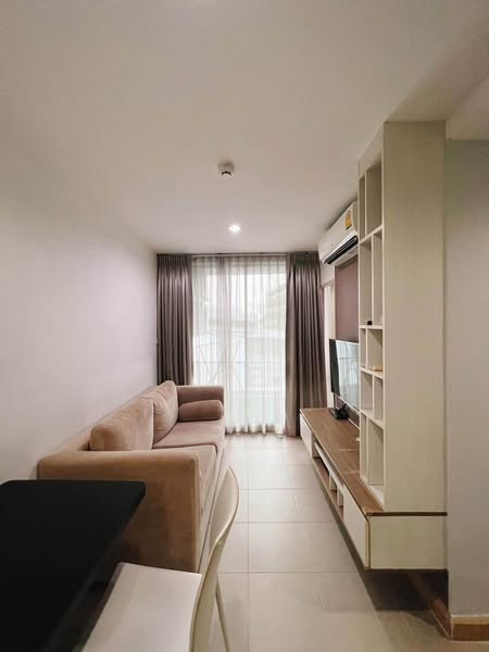bedroom and living room of The Unique Lat Phrao 26