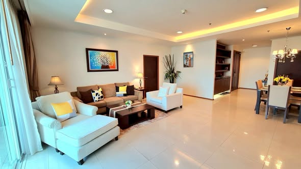 living room and bedroom of Piyathip Place Serviced Apartment