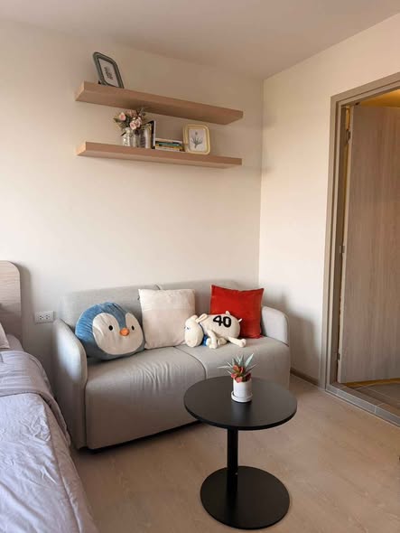 bedroom and living room of ดีคอนโด แอร์ ลาดกระบัง