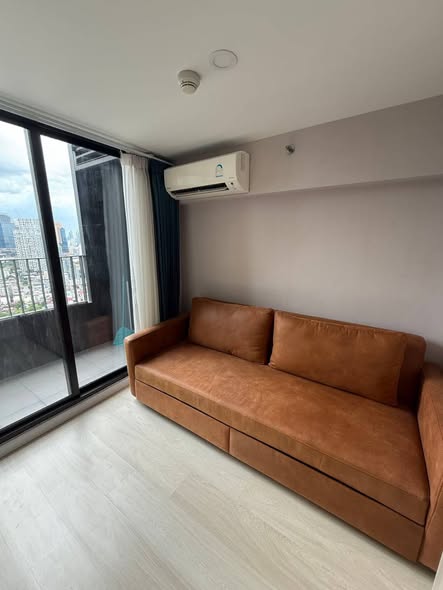 living room and bedroom of KnightsBridge Prime Sathon